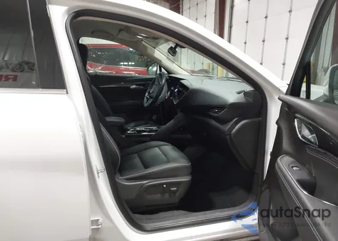 2023 Buick Envision Essence Awd z USA, uszkodzony, nr VIN LRBFZPR48PD018147